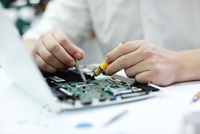 PC service technician working on computer repair